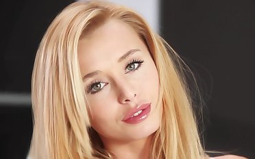 Blonde European model posing for Playboy